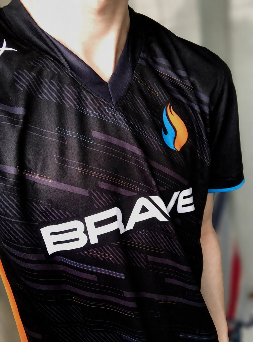 Close-up of a player wearing a Brave Esports jersey